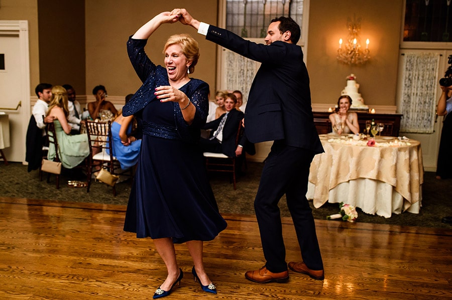 Groom spinning his mom during mother/son dance.
