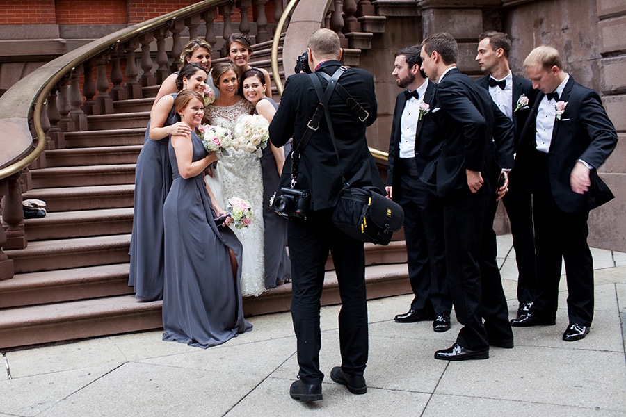 Philadelphia Wedding photographer, Dan Moyer takes photos of bride and bridesmaids during wedding day.
