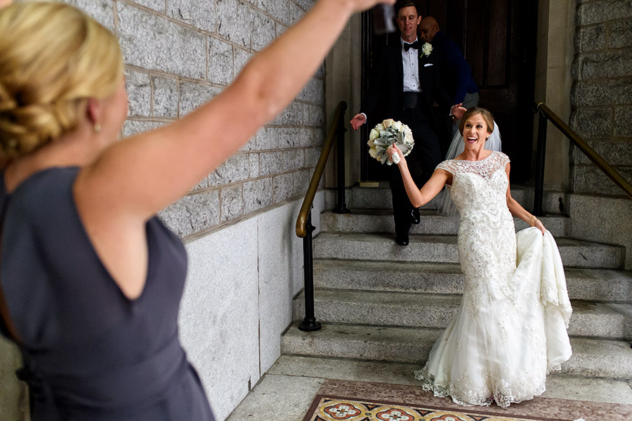 Bridesmaid screams as she sees bride after being married.